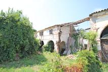 PORZIONE DI RUSTICO CON TERRENO in Vendita